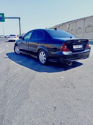 tək oturacaqlar: Chevrolet Evanda: 1.8 l | 2005 il Sedan — 2