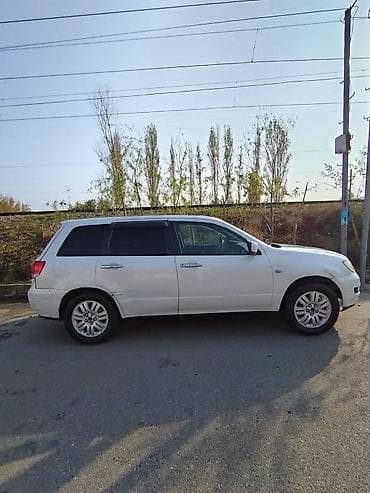 Mitsubishi Outlander: 2.4 л | 2001 г. 390000 км Кроссовер