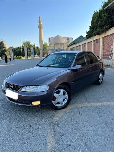 садор диски: Tünd boz rəngdə "Opel Vectra" modeli, sedan tipli avtomobil — 1