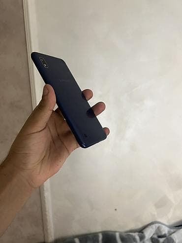 samsung s corby: Samsung Galaxy A10, 32 ГБ, цвет - Голубой, Отпечаток пальца, Face ID — 4