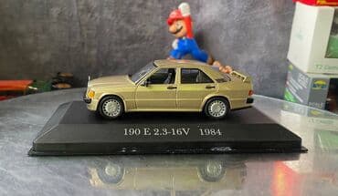 metbex tavan modelleri: Коллекционная модель Mercedes-Benz 190E 2.3 16V W201 gold 1984 EDICOLA — 7