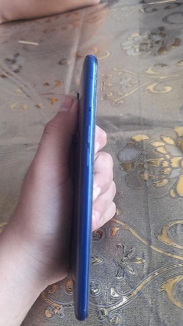 smart tv kanallar: Samsung Galaxy A10, rəng - Göy, Sensor — 1