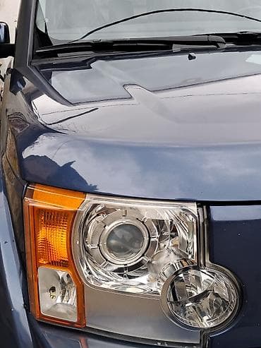 4 qapi niva: Land Rover Discovery 3 – tünd mavi rəng, tam ölçülü SUV. Əsas — 2