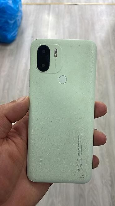 Redmi A2+ – açıq yaşıl rəngdə - Model: Redmi A2+ (ekranda “Cihaz adı