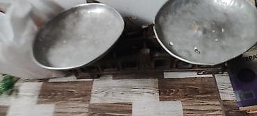 Qədimi sivetdən qalma daş tərəzi. Qədimi şirəcəkən maşın