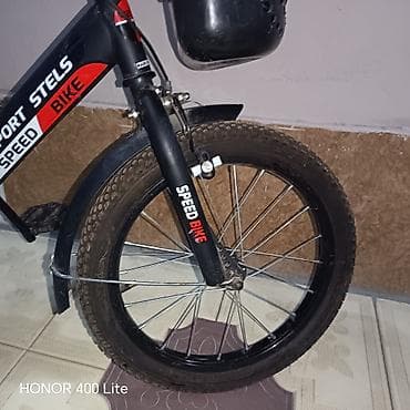 Dörd təkərli Uşaq velosipedi Stels, 16", sürətlərin sayı: 1, Ünvandan götürmə