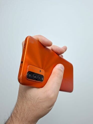 Мобильные телефоны: Redmi 9T, 64 ГБ, цвет - Оранжевый, Две SIM карты — 7
