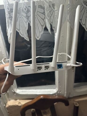 naxtel elaqe: Ağ rəngdə olan Xiaomi router, evdə və ya ofisdə internetə qoşulmaq — 3