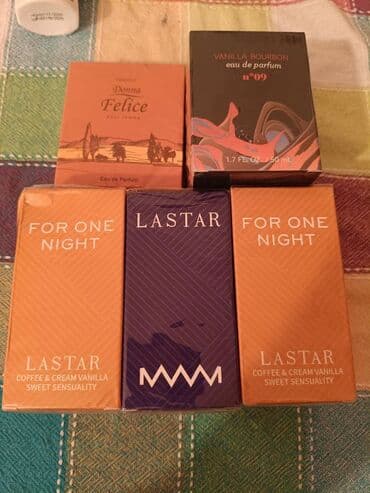 Kişi və qadın ətirlər .Biri 22azn