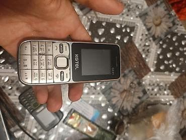 philips xenium 9@9s: KGTEL C2-01 düyməli mobil 2 kartlı telefon Xüsusiyyətlər: - Kompakt — 1