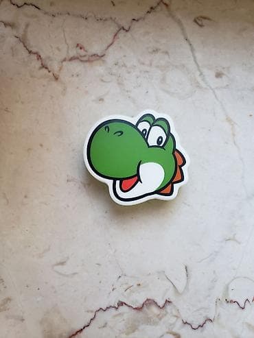 Yoshi temalı stiker - Dizayn: Yaşıl rəngli Yoshi personajının baş