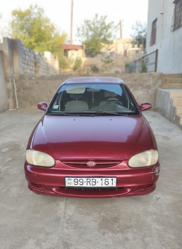 06 sekileri: Kia Sephia: 1.6 l | 1998 il Sedan — 1