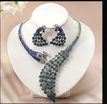 Сумки: Təsvir: - Zümrüd-yaşıl və safir-mavi daşlarla bəzədilmiş tovuzquşu — 1