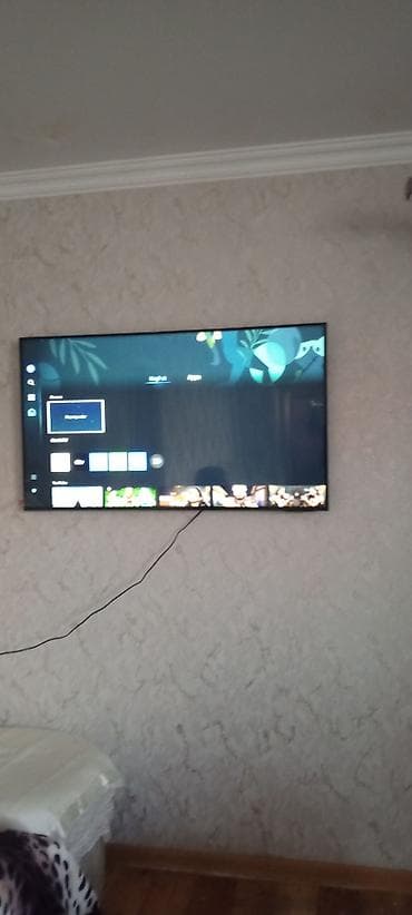 smart televizor satilir: Smart TV və pult - Təxminən 43–50 düym diaqonallı, nazik çərçivəli — 3