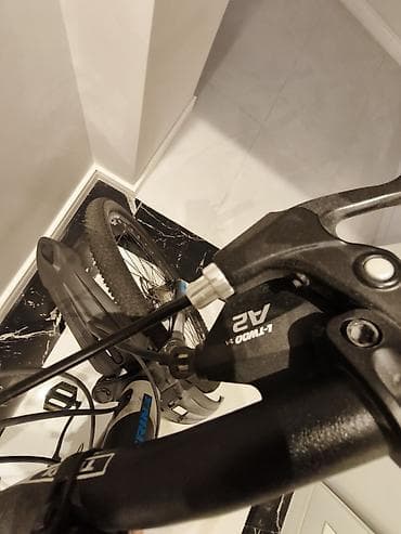 yesebet: TRINX dağ velosipedi – 27.5” Texniki xüsusiyyətlər: - Çərçivə: TRINX — 5