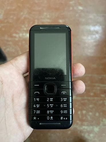 philips xenium x525: Nokia 5310, rəng - Qara, Düyməli — 1