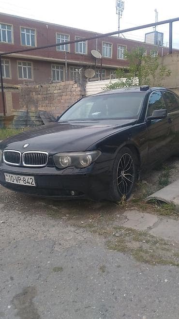 bmw e39 radiator: BMW 7 Series (E65) sedan – qara rəngdə, arxa ötürməli lüks biznes — 3