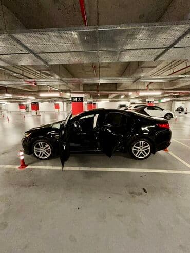 xrom diski: Kia Optima – qara rəng, sedan kuzov. Şəhərdaxili və magistral yollarda — 6