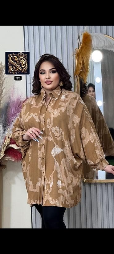 yeni geyim: Modeli: Oversayz qadın köynəyi Detallar: - Uzun, sərbəst kəsim; — 2
