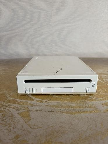 mac mini m4: Nintendo Wii PAL tam işlək vəziyyətdədir. Dəst şəkildə görünən bütün — 8