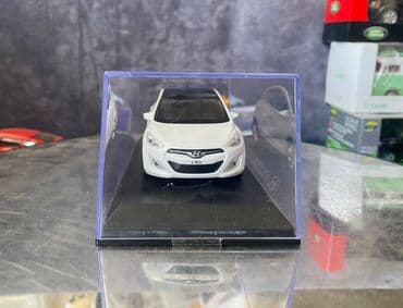 maşın modeli: Коллекционная модель Hyundai i30 5 door white 2012 Pino B&D Scale — 7