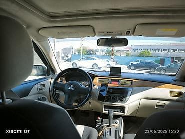 cəliloğlu avto: Mitsubishi Lancer sedan – gümüşü rəng, qara disklər. Nömrə: 77-NE-396 — 8
