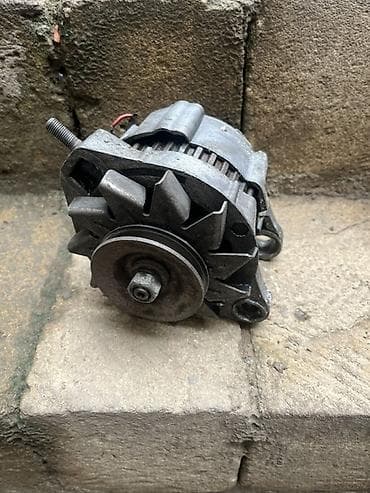 Alışma sistemləri: Avtomobil generatoru (alternator) - Ön hissədə sancaqlı kasnak və — 2