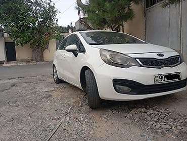 ravon r4 lizing: Kia Rio: 1.4 l | 2012 il Sedan — 2