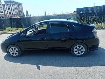 sprinter satisi: Toyota Prius (2-ci nəsil) hibrid hetçbek - Rəng: qara - Kuzov: 5 — 4