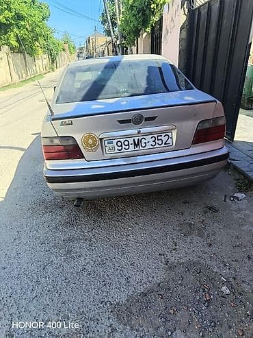 bmw bufer: BMW 3 series: 1.8 l | 1994 il Sedan — 6