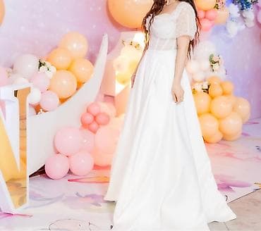 Ustun cixarib qisada geyinmek olur 650 e tikilib 300e satilir s razmer