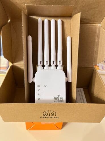 mi wifi repeater: Ağ rəngli, dörd xarici antenası olan bu WiFi təkrarlayıcı mövcud — 1