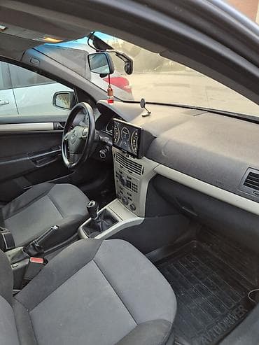 aston martin rapide 6 v12: Opel Astra: 1.3 l | 2008 il Universal — 6