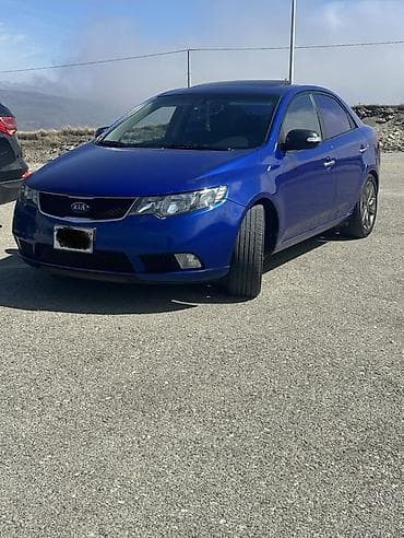 park maşını: Kia Cerato: 2 l | 2009 il Sedan — 4