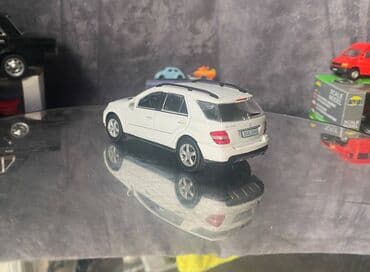 metbex tavan modelleri: Коллекционная модель Mercedes-Benz ML500 W164 white 2007 DeAgostini — 7