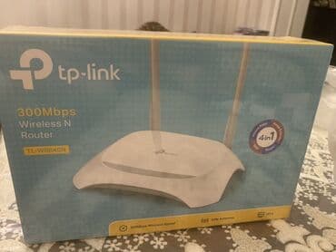 simsiz rabitə: TP-Link şirkətindən olan 300Mbps sürətli simsiz N router. Yığcam ağ — 1
