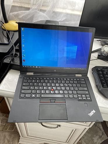dinamik pioner: Lenovo ThinkPad Yoga seriyalı 2‑in‑1 noutbuk Xüsusiyyətlər: - 14" — 5