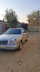 mercedes c dizel: Mercedes-Benz E 240: 2.4 l | 1998 il Sedan — 14