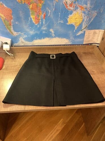 Koton ətək. Məktəbli qızlara da olar. 1 defe geyilib. Material qalın