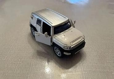 at oyuncaqlari: Ağ rəngli metal oyuncaq ofroud SUV maketi. - Material: die-cast metal — 3