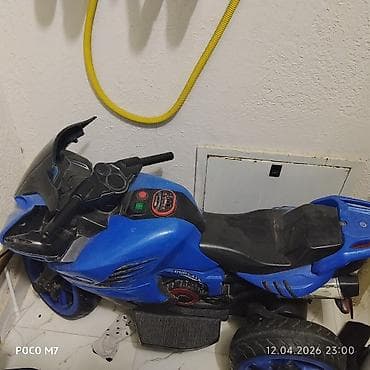 Uşaq üçün elektrikli motosiklet (3 təkərli), mavi rəng.Yeni kimidir
