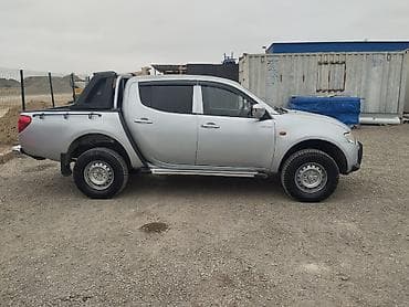 ruçnoy nə deməkdir: Mitsubishi L200 4WD pikap - Gümüş rəng, ikiqat kabin (Double Cab) – 5 — 7