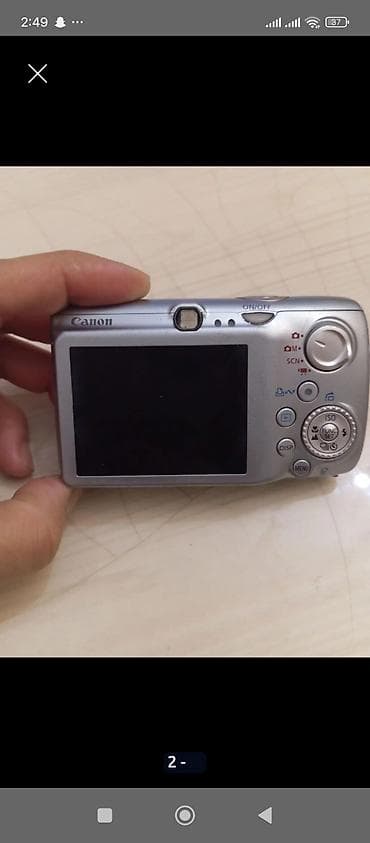 pc hisseleri: Canon Digital IXUS 970 IS (AiAF) kompakt fotoaparat - Gümüşü korpus — 1