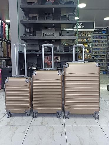 cemodan satilir: Qızılı rəngdə 3-lü səfər çamadanı dəsti - Korpus: sərt ABS/PC tipli — 1