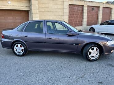 садор диски: Tünd boz rəngdə "Opel Vectra" modeli, sedan tipli avtomobil — 3
