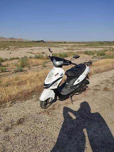 moto n50: Skuter – XRoad, ağ/qara rəng Texniki xüsusiyyətlər və detallar: - — 1