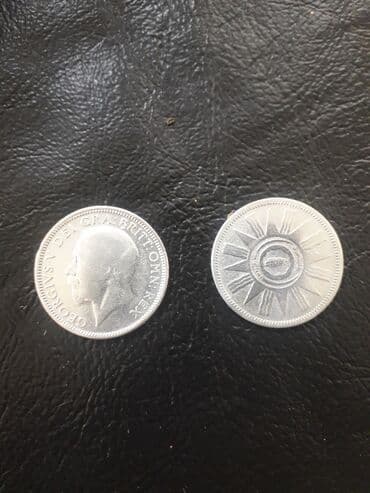 Məhsul: Köhnə pul sikkələri dəsti (2 ədəd) Təsvir: - Soldakı sikkə
