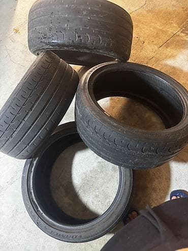 Disklər: Məhsul: Avtomobil şinləri dəsti - Brend: Vitour (üzərində “VITOUR” — 2