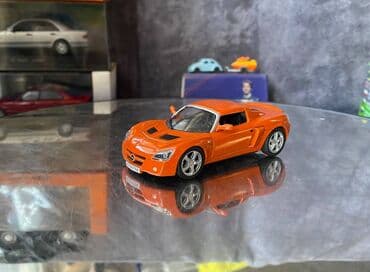 metbex tavan modelleri: Коллекционная модель Opel Speedster orange 2000 DeAgostini Art  — 2