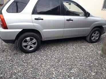 e 124: Kia Sportage – gümüşü rəngdə kompakt krossover/SUV Xüsusiyyətlər: - — 2
